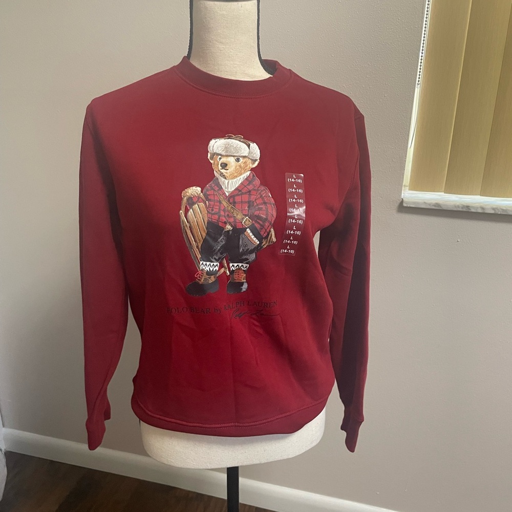This is a Polo Ralph Lauren Big Boys' Polo Bear fleece sweatshirt in red